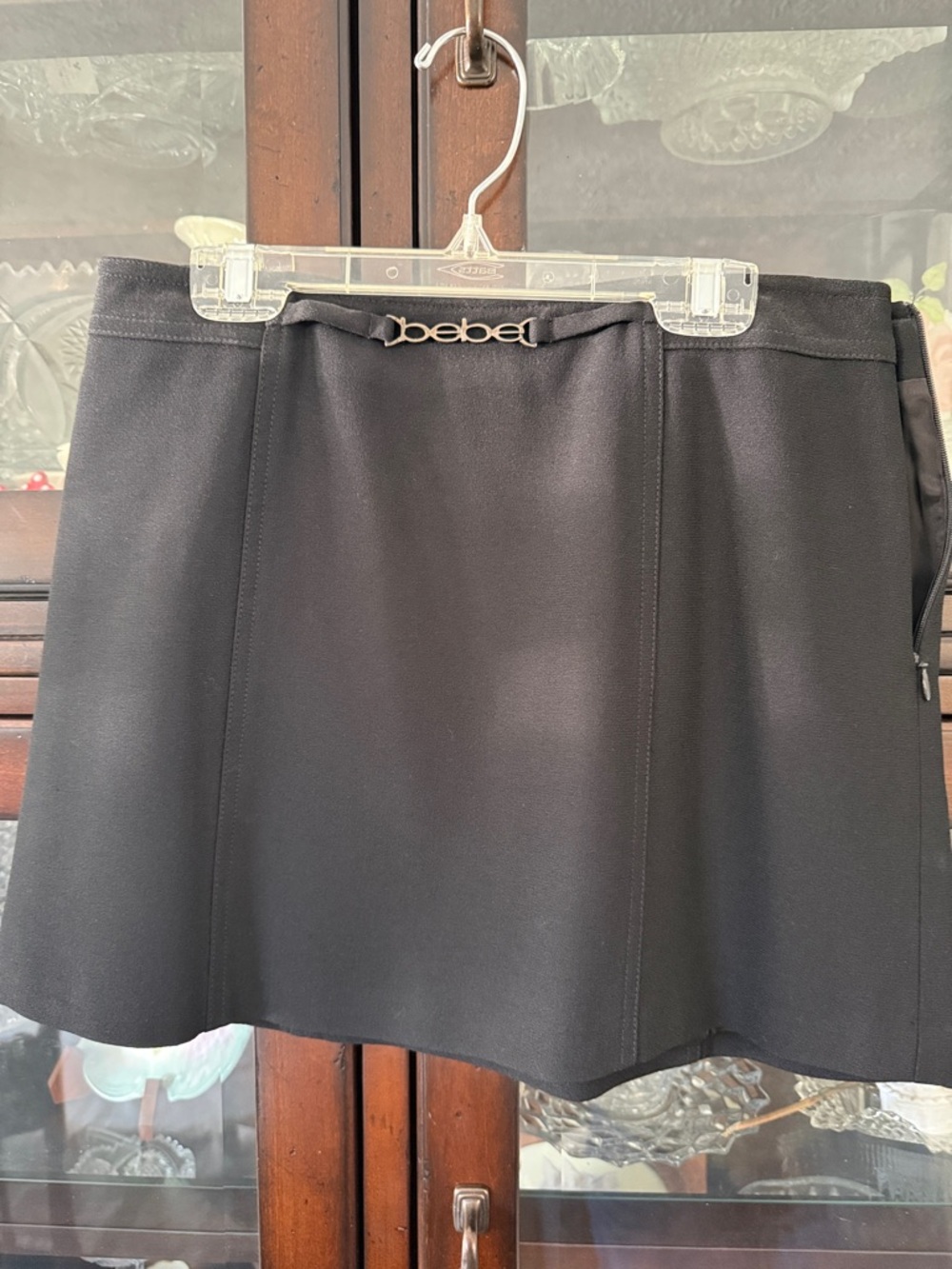 bebe Black Mini Skirt with Logo Hardware